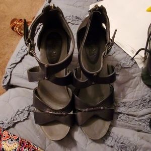 BLACK LEATHER BUSSOLA SANDALS